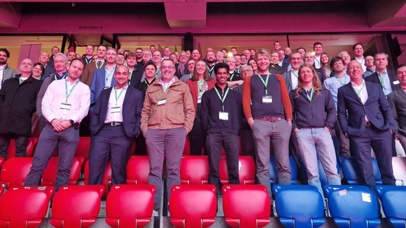 Attendees for Avnet Silica's Powering the Shift event in Munich pose for a photo in the Allianz Arena stand