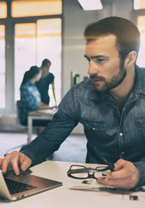 man working on a laptop